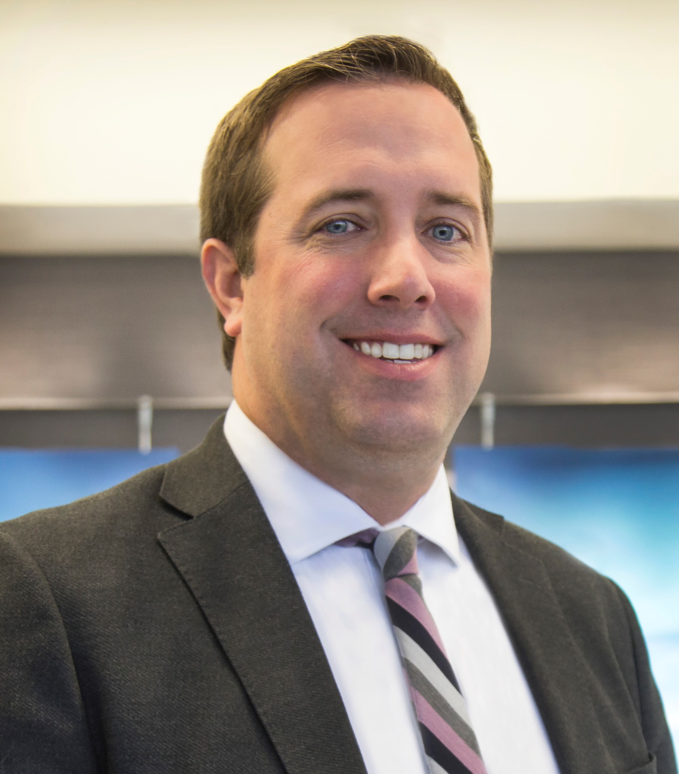 Uploaded Image: /vs-uploads/exec-com/John Reese.jpg